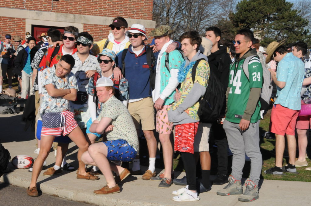 photo of students dressed up like dads on vacation